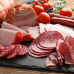 Assortment,Of,Delicious,Deli,Meats,On,Slate,Plate