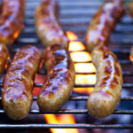 Grilling,Sausages,On,Barbecue,Grill.,Bbq,In,The,Garden.,Bavarian