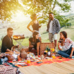 Picnic,In,The,Countryside.,Group,Of,Young,Friends,,At,Sunset
