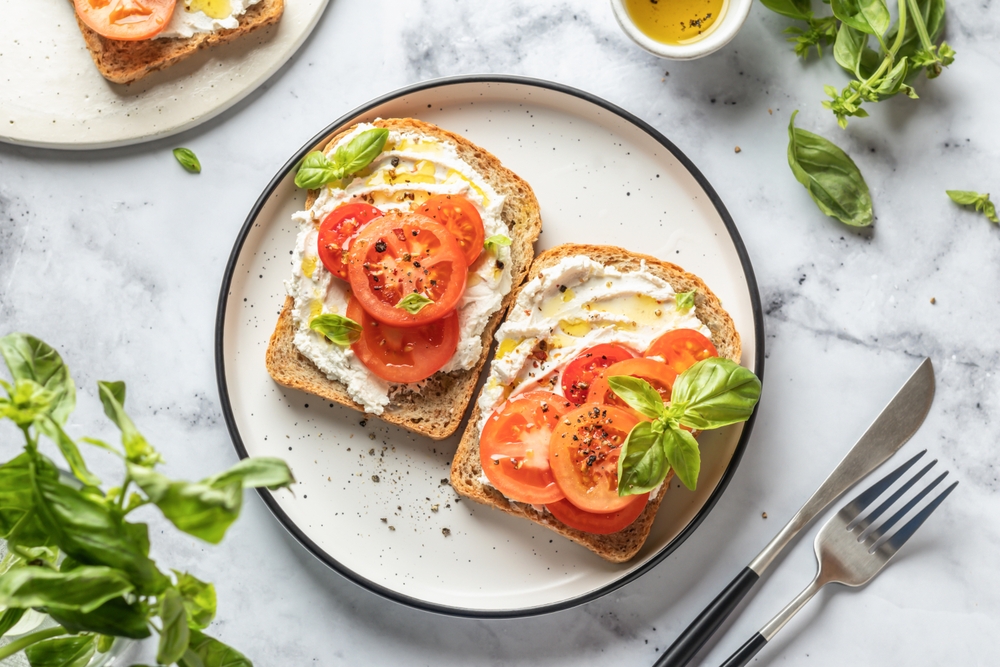 Sandwiches,Or,Toasts,With,Tomatoes,,Cream,Cheese,,Olive,Oil,And